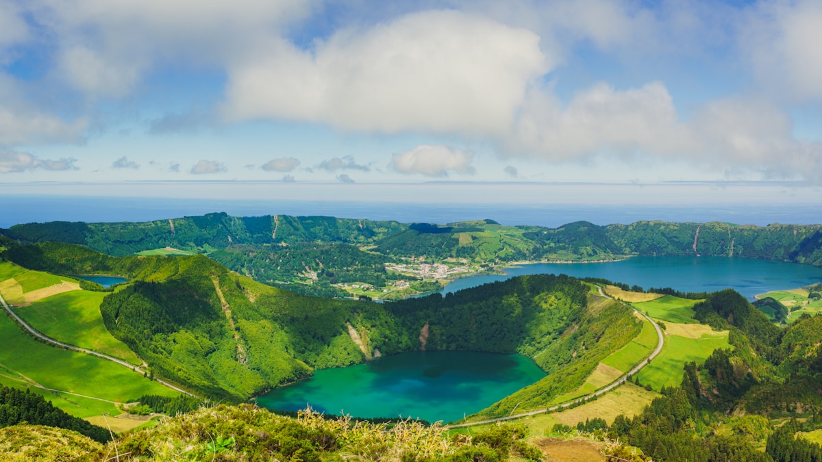 Panoramic view of the green and blue twin crater lakes at Sete Cidades, São Miguel, Azores, Portugal