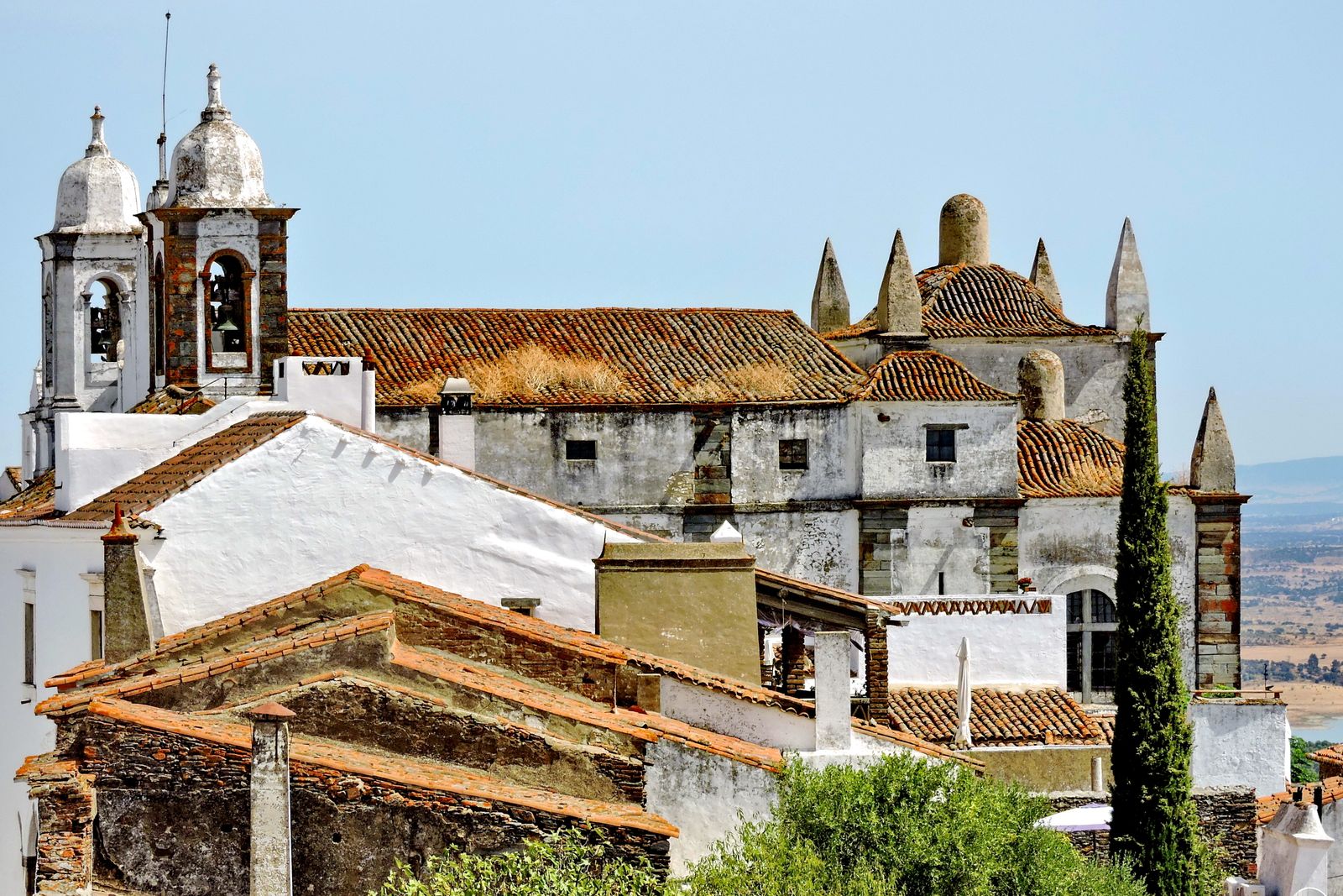Whitewashed buildings and terracotta rooftops of Monsaraz village in the Alentejo, Portugal