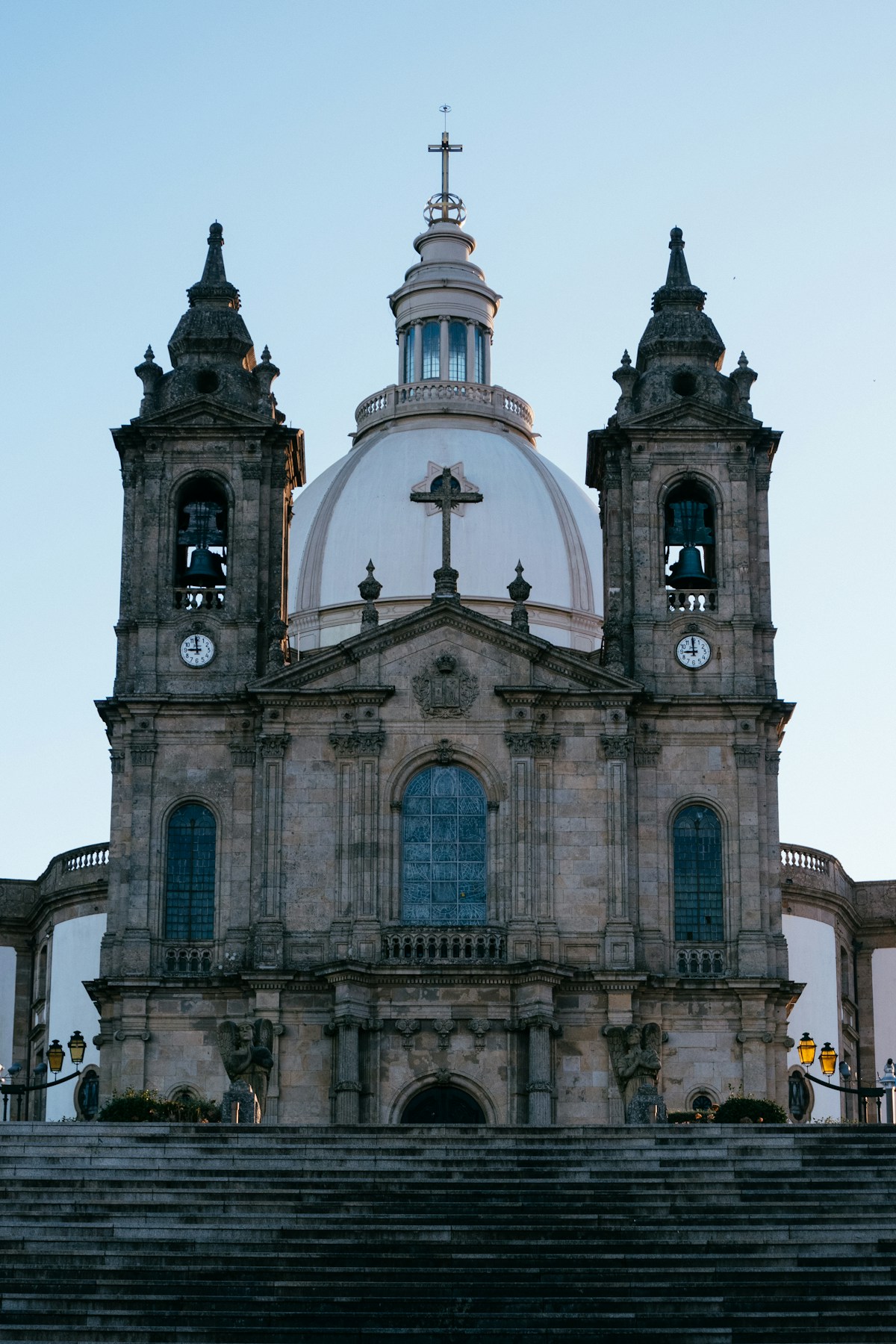 Braga's baroque basilica with twin bell towers and ornate facade rising above a wide stone staircase, northern Portugal
