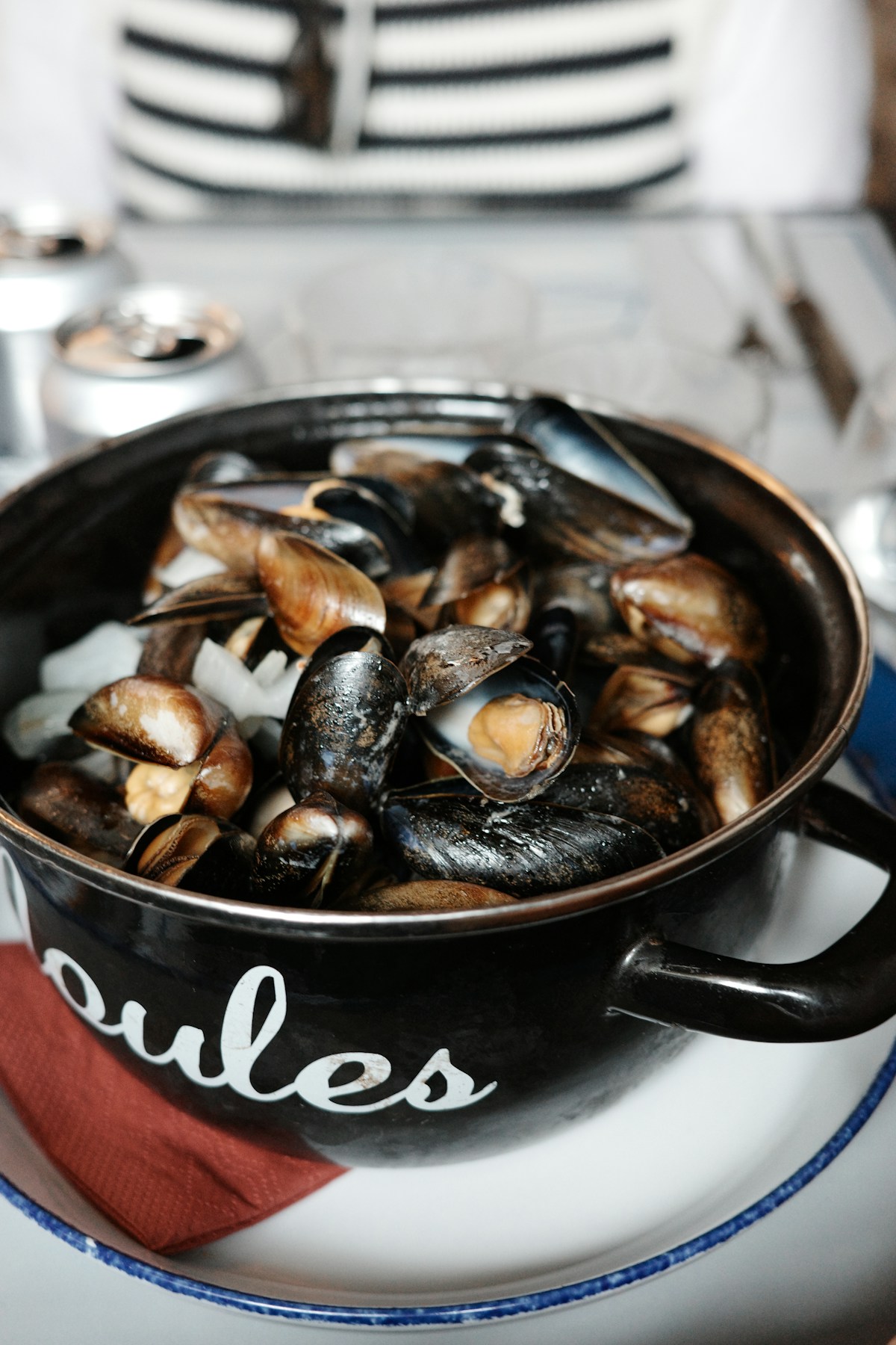 A pot of steamed mussels served at a Portuguese seafood restaurant