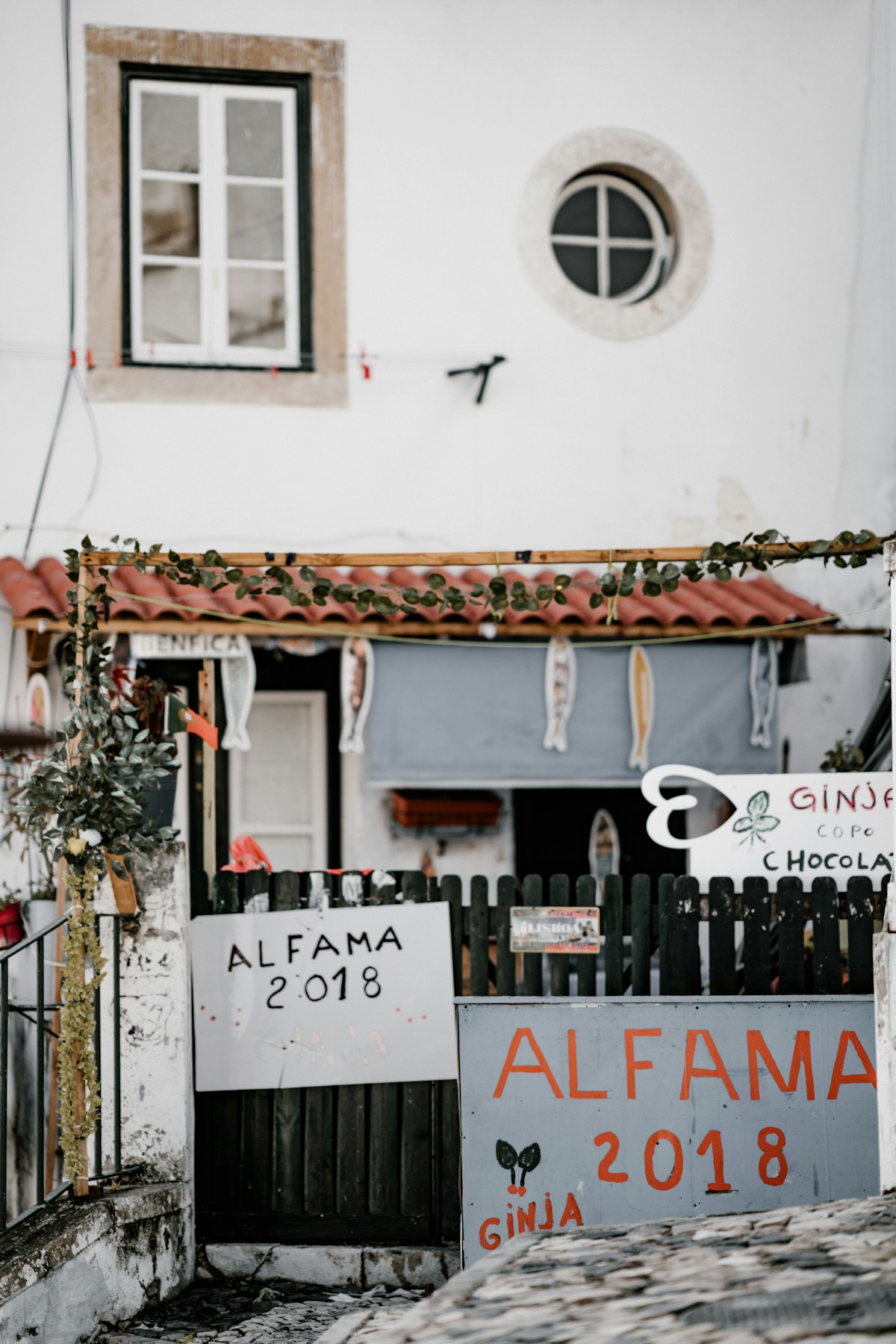 Alfama 2018 street sign on gate, Alfama neighbourhood, Lisbon, Portugal