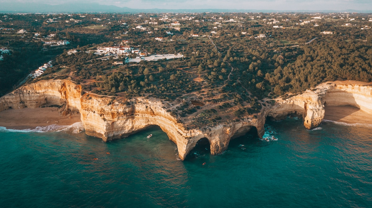 Praia dos Pescadores beach at Albufeira with the old town cliff behind